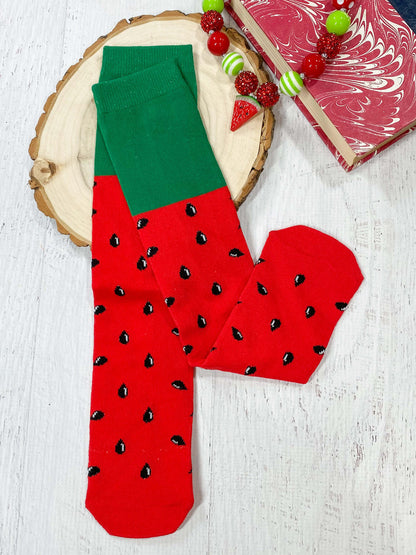 Berry socks with a green top and red bottom with black seeds