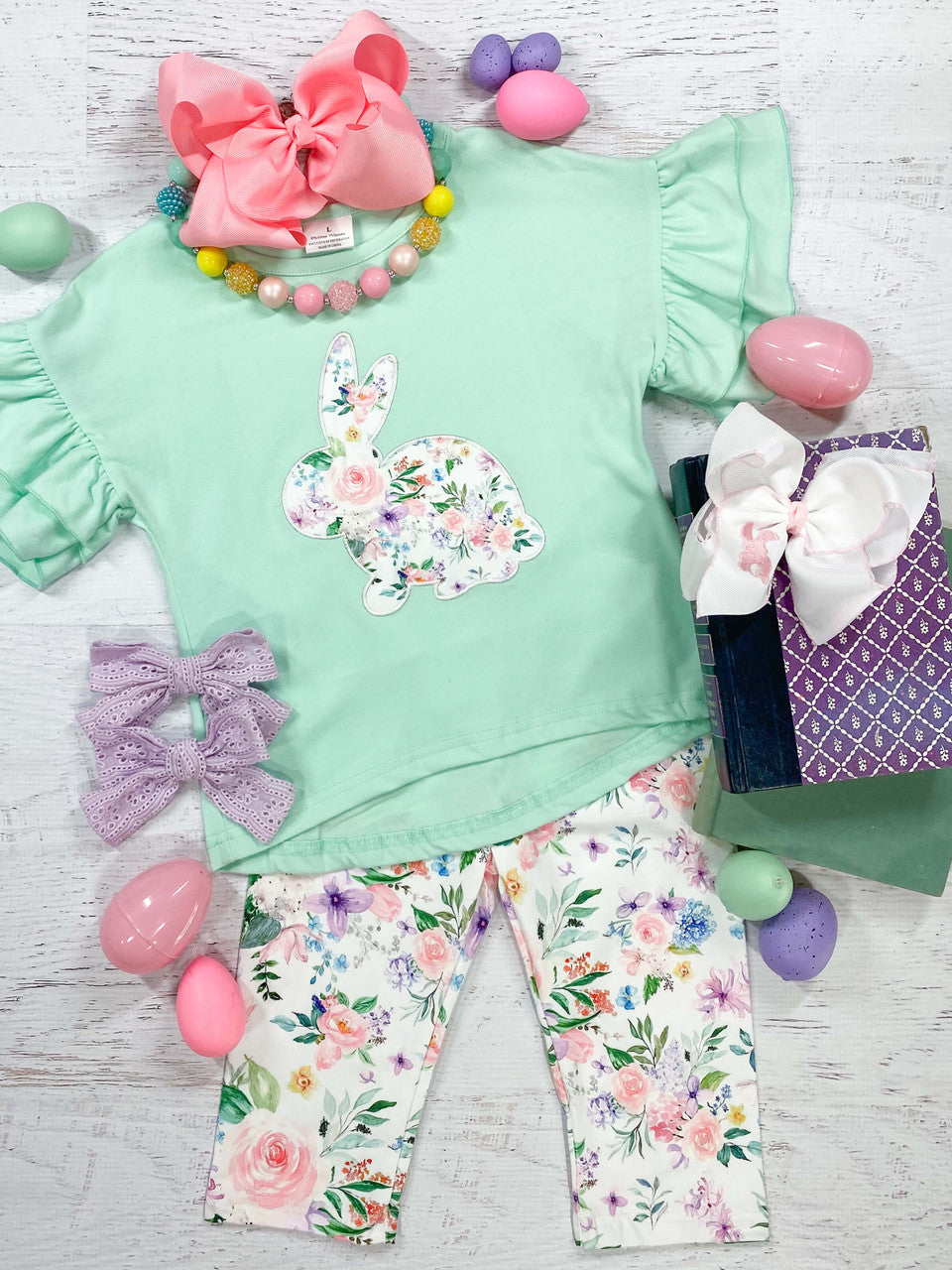 Mint ruffle sleeve top with a floral bunny applique, paired with coordinating floral capri leggings. 