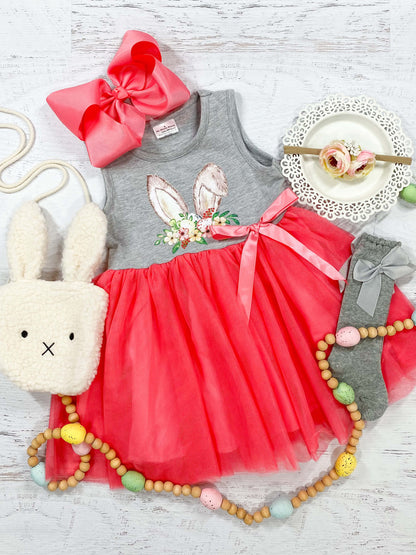 Easter bunny ears with a floral crown, grey sleeveless dress with a pink bow, and pink tulle tutu dress.