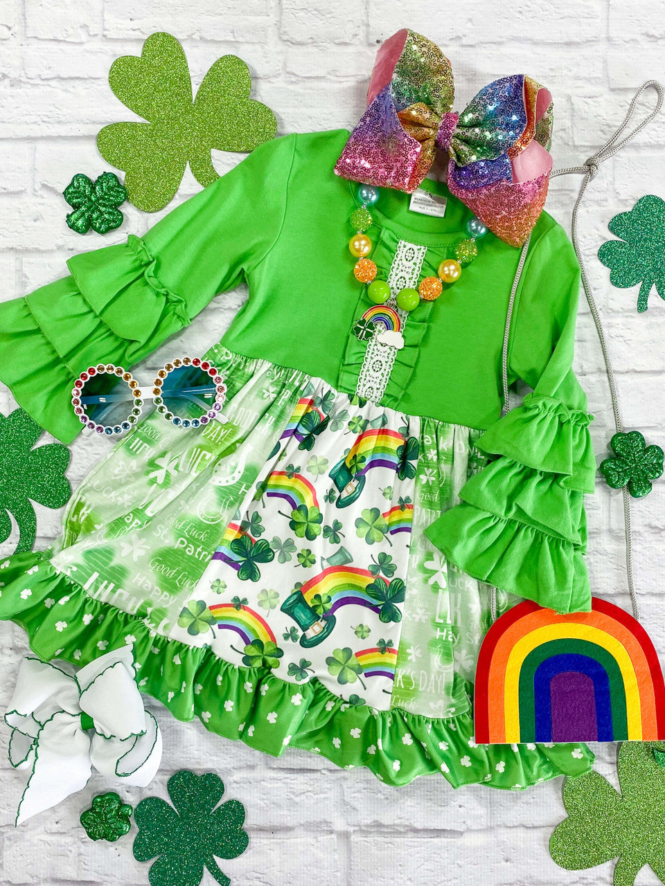 Green patchwork dress with rainbows & shamrocks design. 