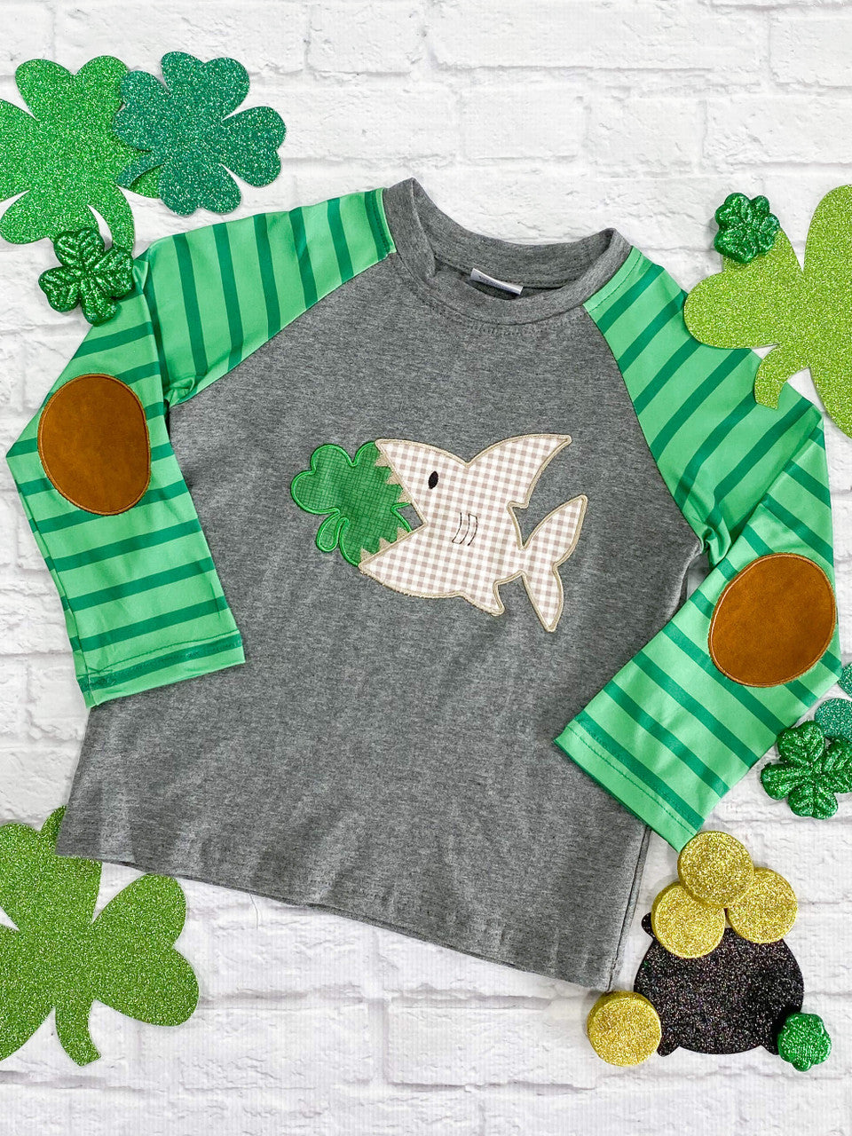 St. Patrick's Day raglan shirt for boys with a shark and three-leaf clover applique.