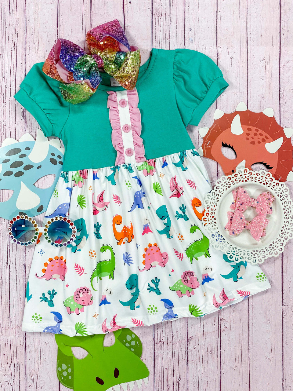 Teal top with pink center ruffle and Dino print bottom dress