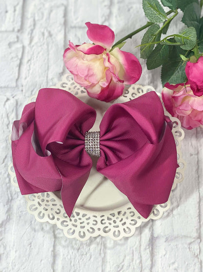 Texas size plum rhinestone bow