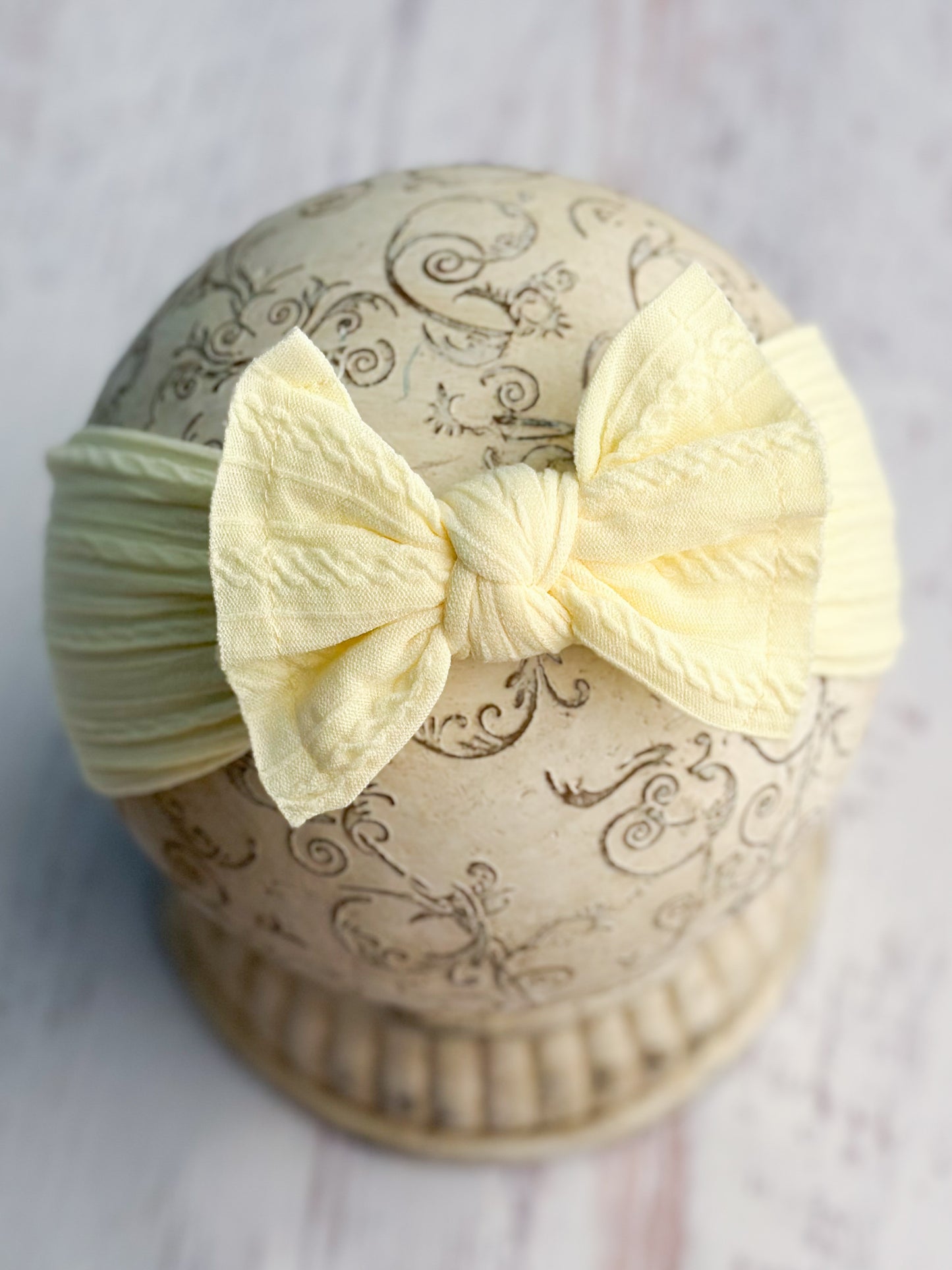 light yellow cable knit bow headband