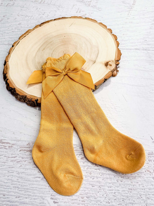yellow socks with adorable bow