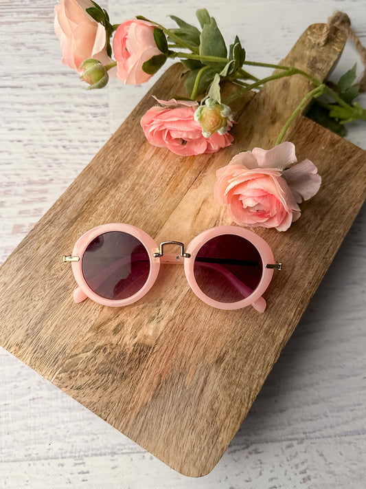 Light pink framed sunglasses for girls