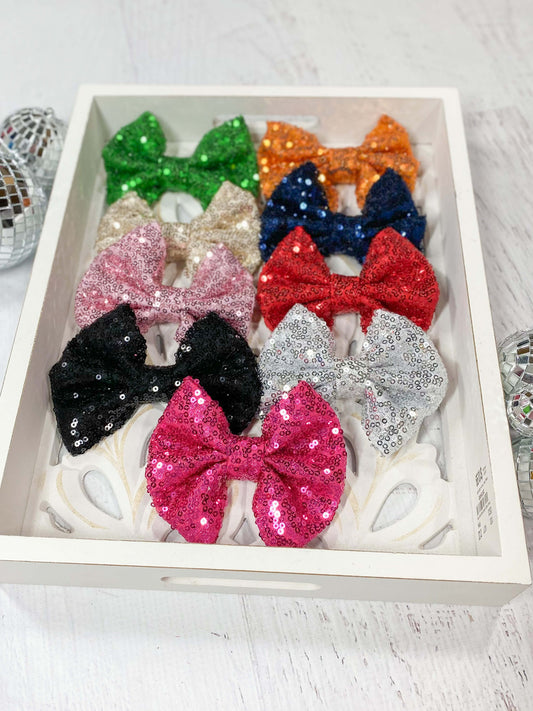 Sequin hair bows in several different colors