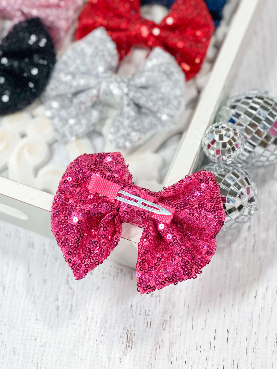 Photo of the back of the sequin bows