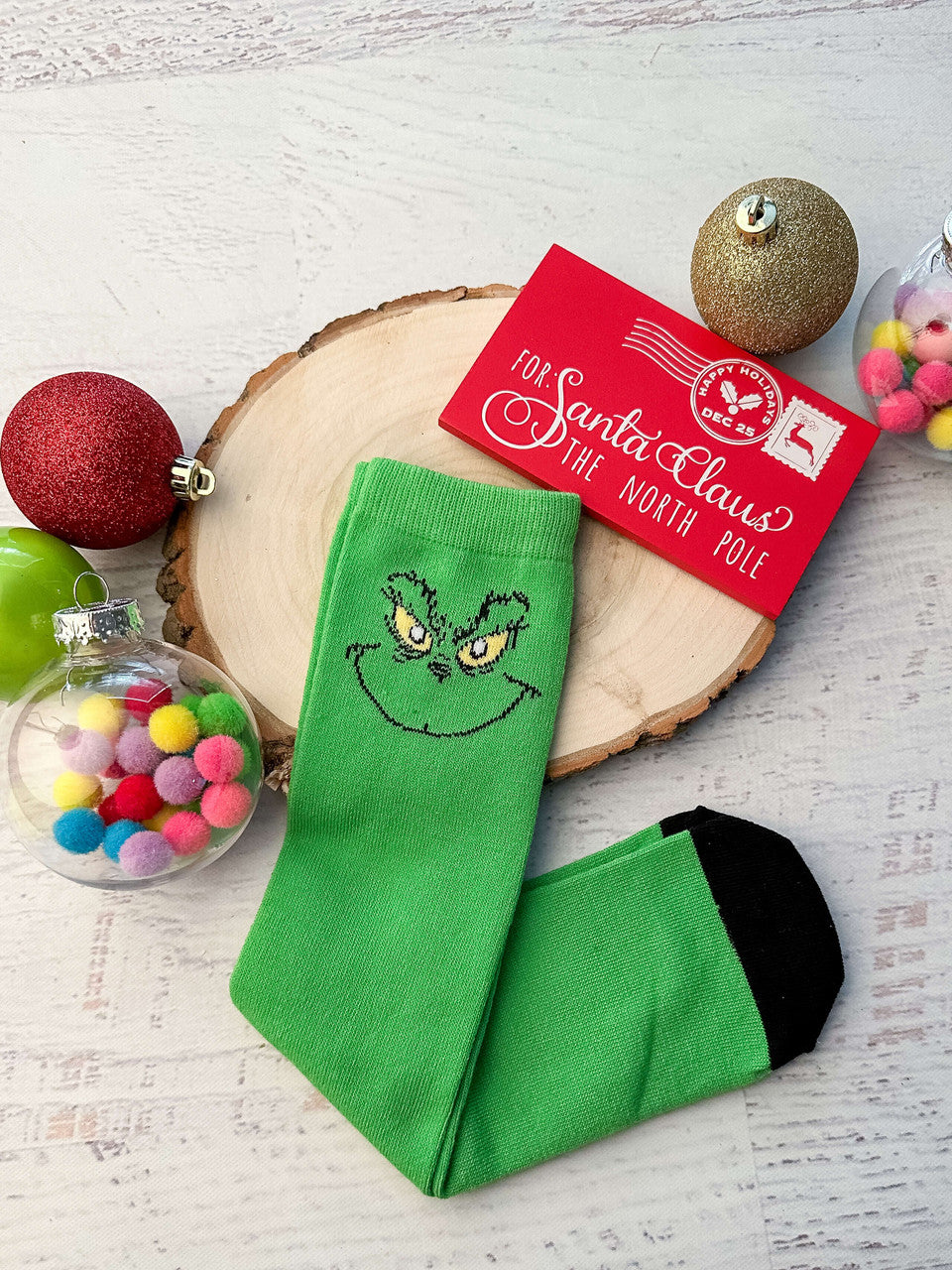 Lime green grinch face socks