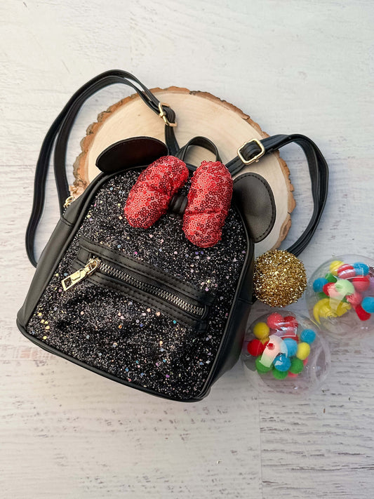 Black sparkly Minnie Mouse mini backpack.