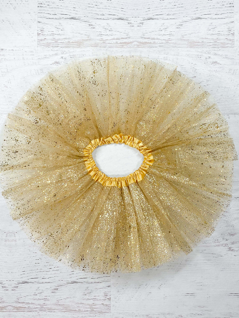 Gold sparkle baby tutu.