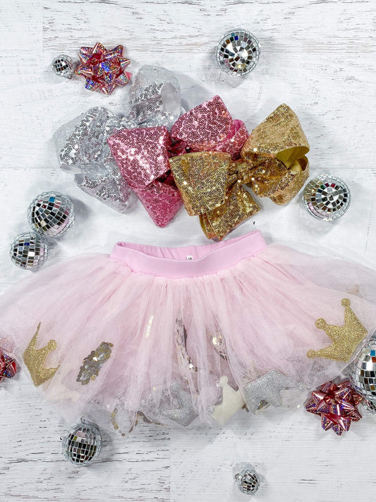 Glitter confetti and crowns filled tutu. For up to 5yrs.