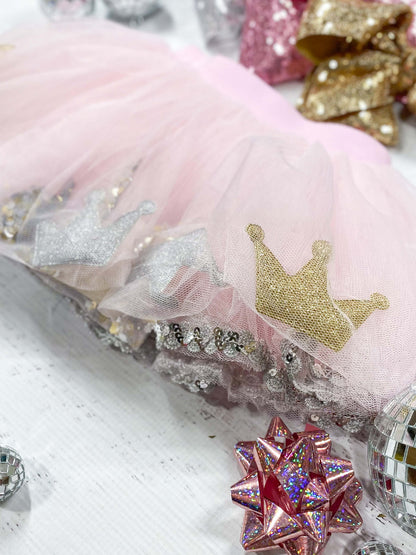 Glitter confetti and crowns filled tutu. For up to 5yrs.