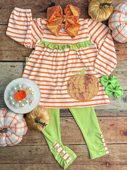 Orange striped pants set with green ruffle accents and a sequin pumpkin appliqué.