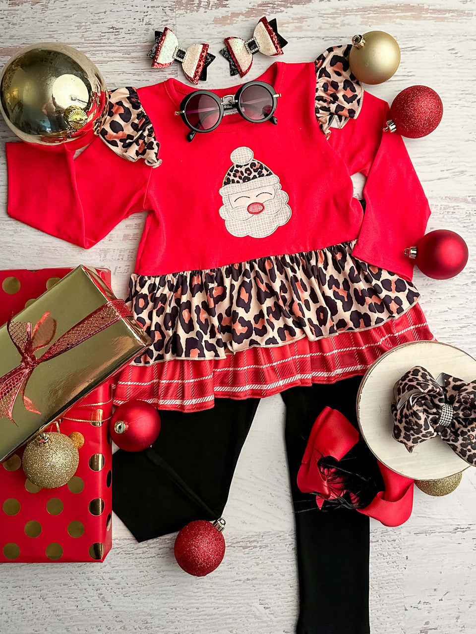 Long sleeve red top with leopard ruffle detailing and a Santa applique with matching pants