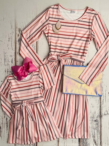 Mommy & Me long sleeve pink striped dress with a tie waist