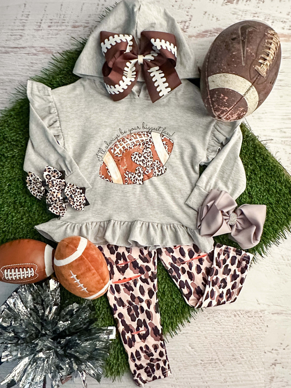 Long sleeve grey hooded ruffle top with football design with coordinating leopard distressed leggings