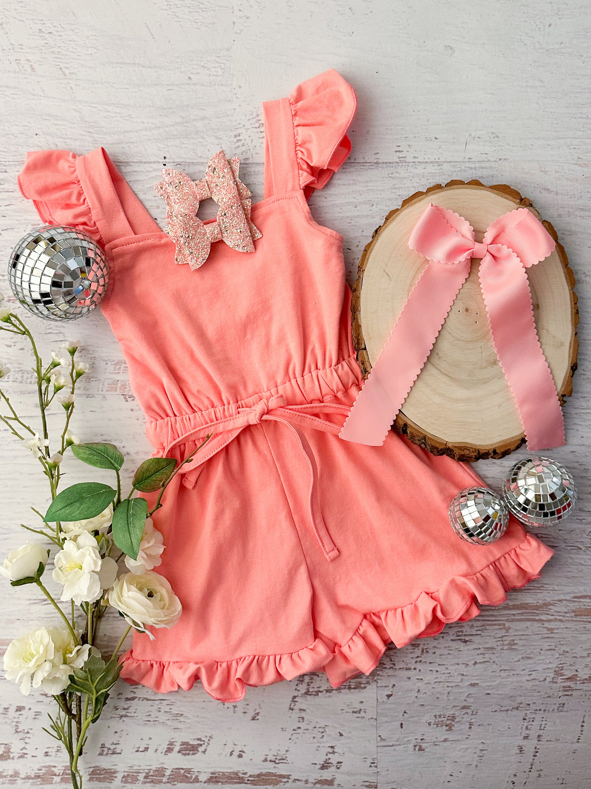 Coral Tied Ruffle Romper