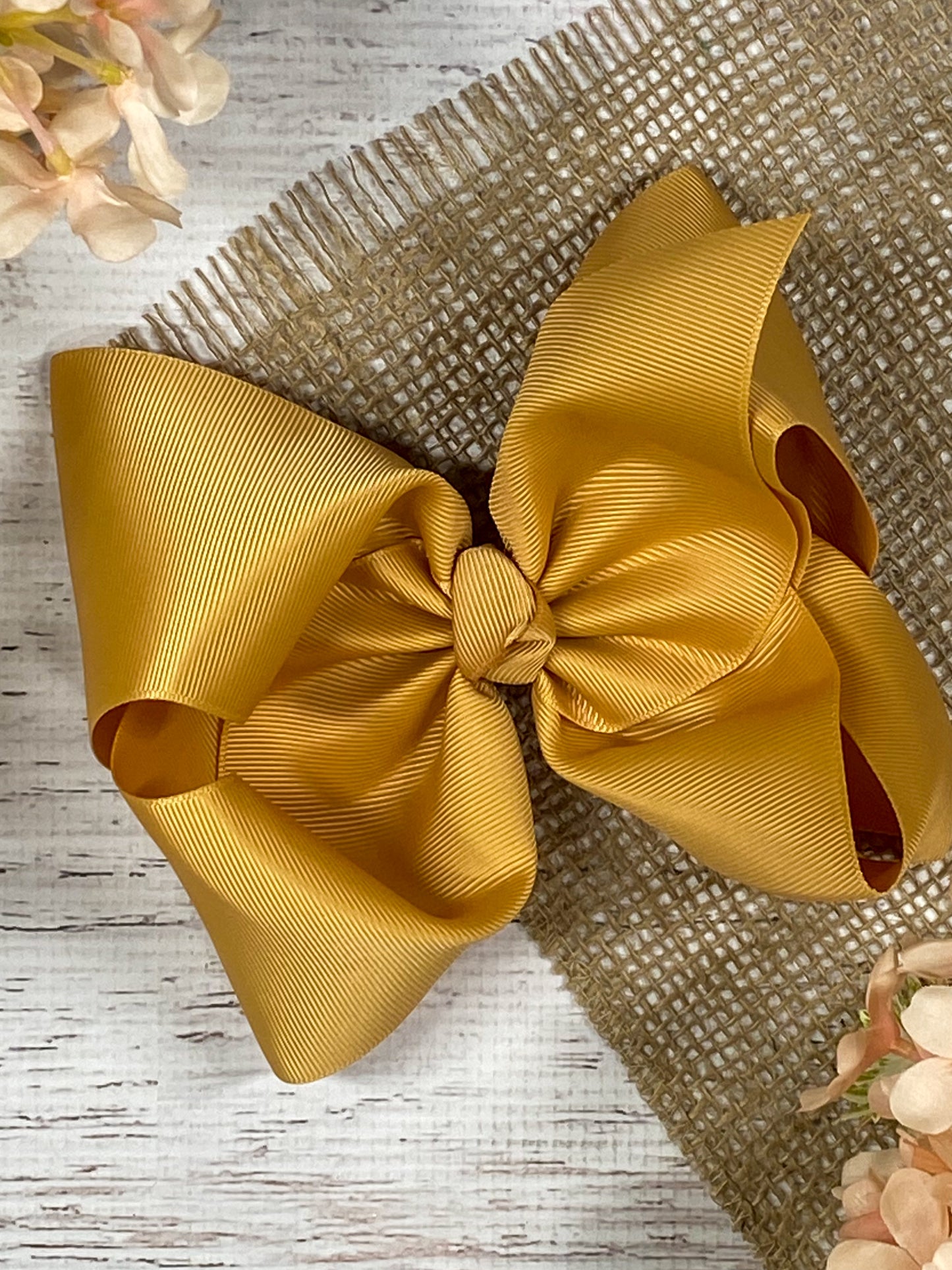 gold texas size hair bow