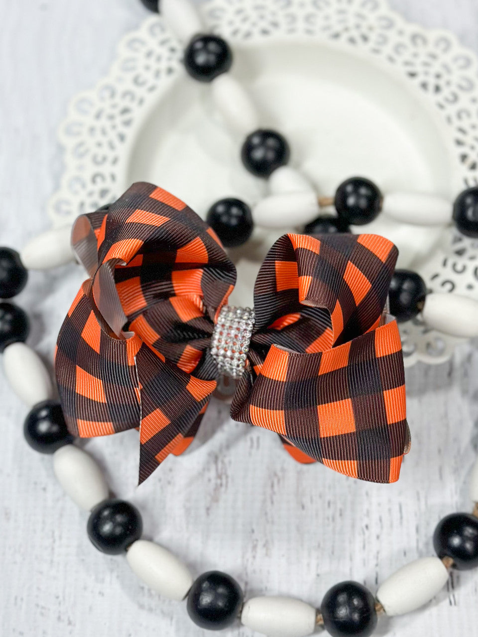 Orange and black buffalo plaid oversized hair bow