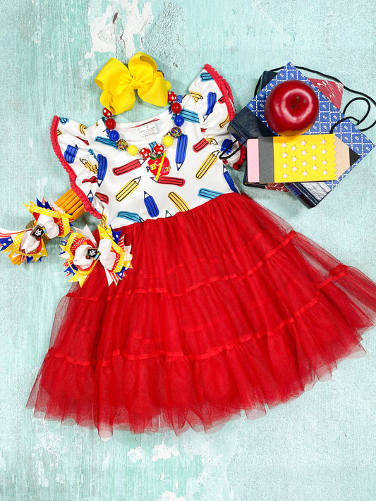 white with pencils and red tutu dress with red detailing