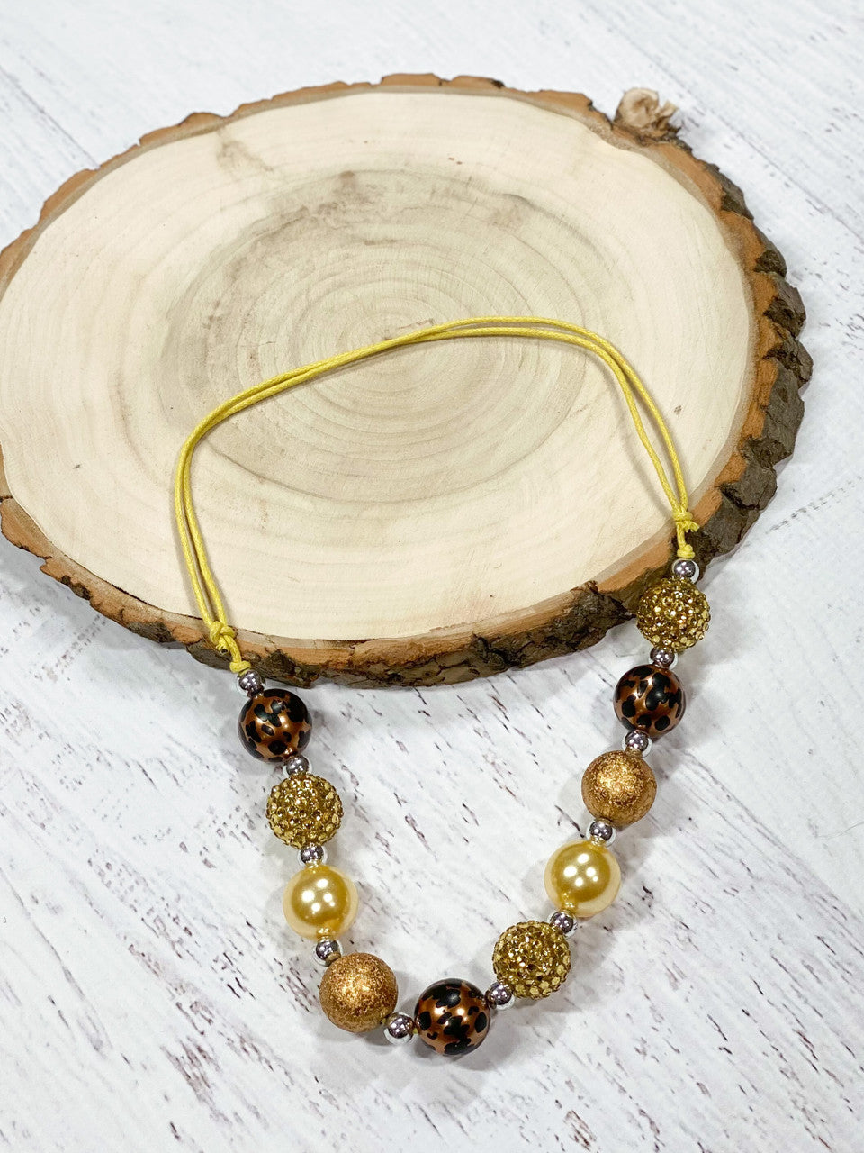 Adjustable brown, animal print and gold necklace, 17"