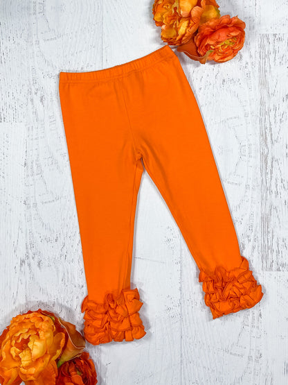 Orange ruffled icing leggings