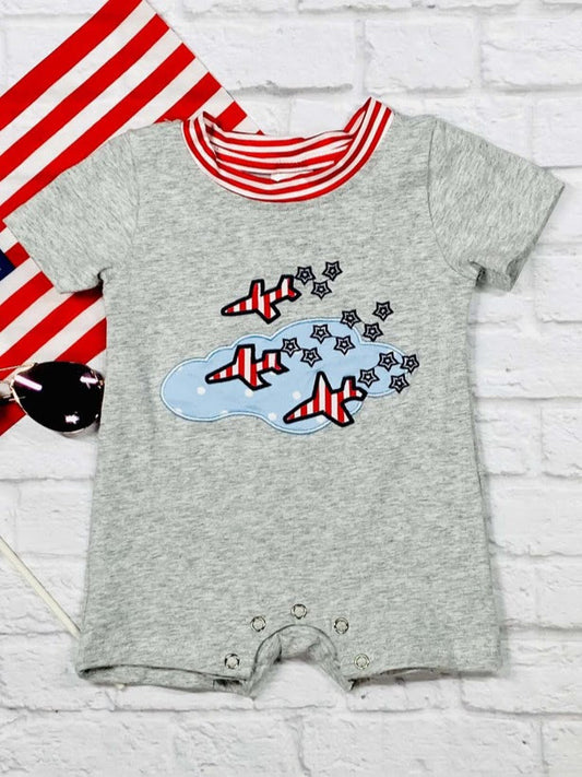 gray baby romper with flying planes