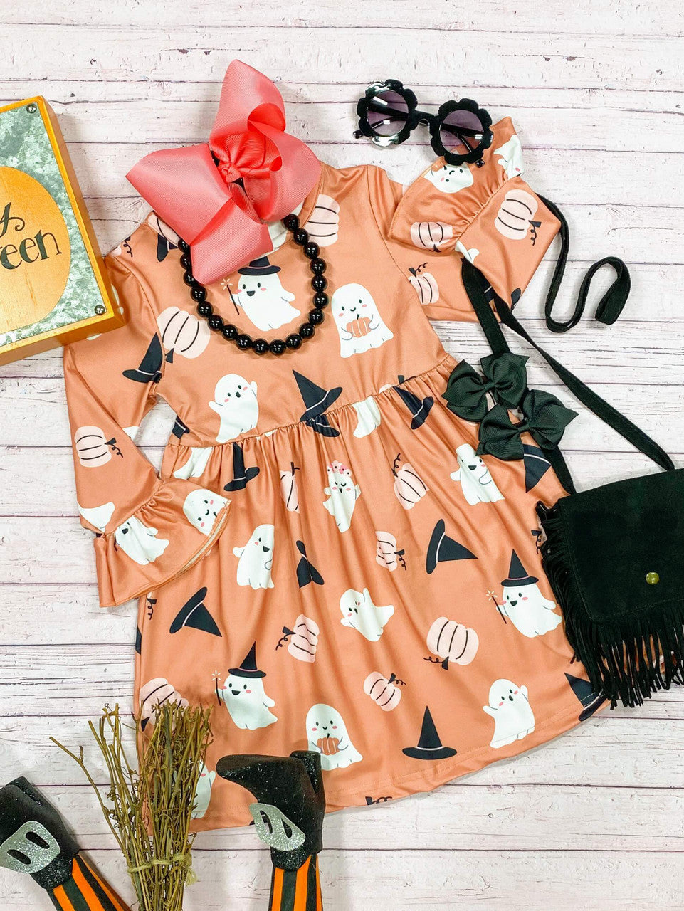 orange dress with cute ghosts, witch hats, and pumpkins