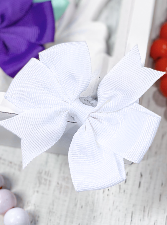 white pinwheel bow