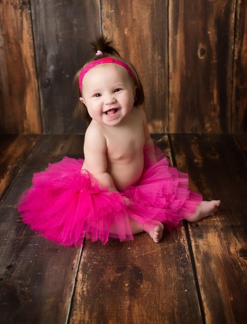 Baby tutu in hot pink on model - Tutus for infants 0-2 years
