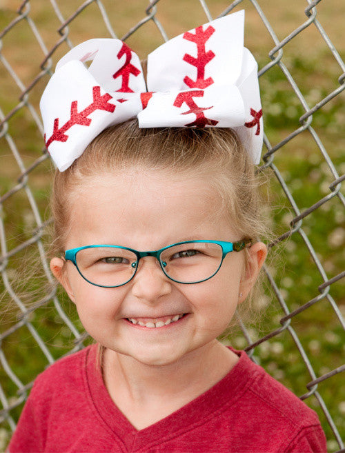 Baseball Texas size  hair bow for girls shown on model from another angle
