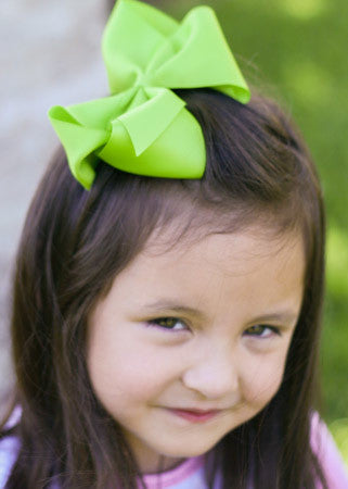 lime green classic girls hair bow on model 