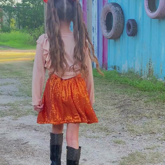 pumpkin sequin skirt and football video