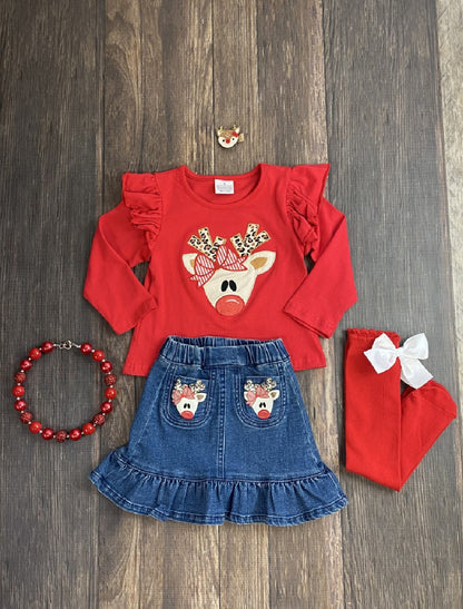 This red cotton top features an adorable red nosed reindeer with animal print antlers applique and ruffled shoulders. The denim skirt is ruffled with reindeer on the pockets. 