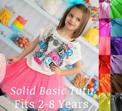 Neon pink tutu layered over turquoise tutu